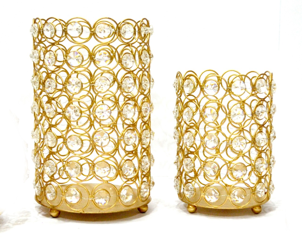 Shadow Candle Holder, Tlight Holder Set, Candle Holder Set, House2home, h2h, Modern Candle Holder, Modern Lantern, Shadow diya, Table Decor, Abstract, Tree Shadow Diya, Diwali Décor, Gift, Return Gift, Crystal Candle Holder, gold crystal candle holder, gold metal candle holder, crystal candle holder set, decorative candle holder, gold tealight holder, crystal tealight holder, gold votive holder, luxury candle holder, Diwali candle holder, wedding candle holder, crystal Diwali decor, gold centerpiece candle holder, gold table decor, wedding table decor, golden candle stand, crystal t-light holder, table top decor, gold crystal lantern, festival decor item, home decor candle holder, elegant candle holder, gold decor piece, gold plated candle holder, designer candle holder, festive candle holder, gold gift decor, wedding return gift, housewarming decor, Diwali home decor, crystal home accent, metal wire candle holder, stylish candle holder, gold event decor, anniversary table decor, luxury home gift, premium Diwali gift, Moroccan-style candle holder, bridal shower decor, golden votive holder, reception centerpiece, holiday candle holder, decorative votive set, Indian festive decor, ethnic home decor, glam table decor, modern gold candle holder, crystal embellished candle holder, living room decor item, Pooja candle holder, gold holder for tea lights, golden home accessory, metal mesh candle holder, handcrafted candle holder set, crystal gift decor, gold room accent, luxury wedding favor, golden wire mesh decor, gold candle decor, festive centerpiece, Diwali light holder, decorative table lantern, crystal votive centerpiece, glamorous candle display, gold candle