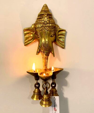 Ganesh Diya, Diya, Pooja Diya, Brass Diya, Diwali Gift, House2home, h2h, home Decor, Decorative, Brass Idol, Modern Diya, Wall Hanging Ganesha, Diya Hanging Ganesha, Brass idols, Brass religious statues, Brass deity figurines, Hindu brass idols, Traditional brass sculptures, Brass temple idols, Brass worship idols, Handcrafted brass idols, Antique brass idols, Artisanal brass idols, Indian brass idols, Brass deity idols, Sacred brass figurines, Brass god statues, Decorative brass idols, Custom brass idols, Brass home decor idols, Religious brass artifacts, Vintage brass idols, Spiritual brass sculptures, Hanging brass Ganesh diya, Wall-mounted Ganesh diya, Brass Ganesha lamp decor, Wall-hung brass deity diya, Ganesh diya wall art, Brass Ganpati oil lamp, Ganesha diya sculpture, Wall decor with diya, Brass Ganesh deepam, Hanging Ganapati diya, Brass Ganesha wall piece, Ganesh oil lamp art, Diya wall hanging, Brass Ganesh artwork, Wall-mounted diya sculpture