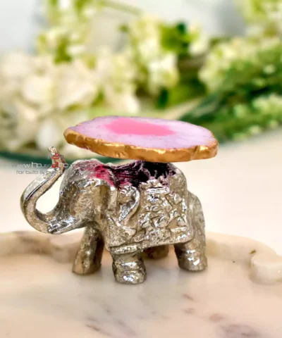 Small Silver Decorative Elephant, Silver Elephant Figurine, Decorative Elephant Sculpture, Elephant Ornament for Home Decor, Silver Elephant Centerpiece, Vastu Elephant Statue, Giftable Silver Elephant, Elephant Decor for Hampers, Metallic Elephant Home Accent, Elegant Elephant Decor Piece, Handcrafted Silver Elephant, Silver Elephant for Living Room, Lucky Elephant Decor, Feng Shui Elephant Decoration, Miniature Silver Elephant, Silver Elephant Desk Decor, Cultural Elephant Figurine, Silver Plated Elephant, Artisan Elephant Sculpture, Indian Themed Elephant Decor, Small Elephant, Agate, Candle Holder, Hamper Decorative, Hamper Filler, Silverware, German Silver Elephant, Diwali Gift, Deor, Silver Elephant, Mutli Color Agate, h2h, Decorative, Here are the keywords separated by commas: Small Metal Elephant with Agate Stone for Gifting, Agate Stone Topped Elephant for Hampers, Decorative Metal Elephant with Agate for Gifts, Miniature Metal Elephant with Agate for Hamper Packaging, Agate Decor Elephant Statue for Gift Baskets, Metal Elephant Figurine with Agate for Gifting, Small Agate Stone Elephant for Hampers, Agate-Topped Metal Elephant for Gift Sets, Elephant Ornament with Agate Stone for Hampers, Agate Embedded Metal Elephant for Gift Packaging, Metal Elephant with Agate Accents for Hampers, Agate Stone Decor Elephant for Gift Wrapping, Artisan Metal Elephant with Agate Stone for Gifts, Agate Crystal Elephant Figurine for Hampers, Unique Agate Topped Elephant for Gifting, Small Elephant with Agate Stone for Gift Boxes, Metal Elephant with Agate Gemstone for Hamper Decoration, Handcrafted Agate Stone Elephant for Gifts, Agate Decorated Mini Elephant for Hamper Gifts, Metal Elephant with Agate Crystal for Gift Baskets