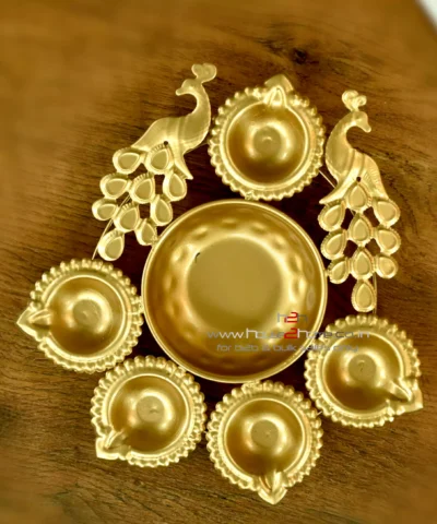 Diwali gift, Small decorative urli, Gold lotus urli, Lotus shaped urli, Metal urli, Decorative metal urli, Gold color urli, Urli for gifting, Wedding gift urli, Decorative gift urli, Gold gift urli, Lotus decoration urli, Urli for hampers, Wedding decor urli, Small gold urli, Lotus urli gift, Gifting metal urli, Decorative gold urli, Lotus candle holder, Potpourri decoration urli, Urli for wax filling, Dry fruit packing urli, Lotus potpourri urli, Decorative candle urli, Small gold lotus urli, Metal lotus urli, Urli with gold finish, Decorative wedding urli, Lotus shaped gift urli, Gold metal urli, Small lotus decor, Wedding favor urli, Decorative centerpiece urli, Lotus shaped candle holder, Gold potpourri urli, Metal lotus candle holder, Lotus wax filling urli, Gift packing urli, Gold lotus decoration, Lotus urli for weddings, Lotus shaped potpourri, Lotus shaped wax urli, Gold decorative urli, Gold lotus candle holder, Metal gold urli, Lotus shaped decorative piece, Small gold decoration urli, Lotus wedding gift, Lotus shaped centerpiece, Urli for dry fruits, Gold gift decoration, Lotus shaped wax holder, Wedding gift packaging, Urli for candles, Small decorative lotus, Gold lotus ornament, Decorative wedding gift, Lotus shaped potpourri holder, Metal lotus wax urli, Lotus shaped decor, Small gold potpourri holder, Wedding gift urli, Lotus candle decoration, Decorative gold lotus, Urli for wax decoration, Lotus urli centerpiece, Gold lotus candle decoration, Small gold wedding gift, Lotus shaped gift packaging, Decorative lotus wax holder, Gold metal decoration, Urli for decorative gifts, Lotus shaped metal urli, Small gold lotus candle holder, Gold decorative piece, Urli for wedding decor, Lotus shaped dry fruit holder, Decorative gold metal urli, Lotus candle holder decoration, Small gold lotus decor, Lotus shaped potpourri decoration, Gold wedding decoration, Decorative wax urli, Lotus shaped candle decor, Small decorative wedding gift, Gold potpourri decoration urli, Metal lotus decorative piece, Lotus shaped wax decoration, Decorative wedding centerpiece, Urli for festive decor, Lotus shaped candle gift, Gold metal decorative piece, Lotus shaped wedding decor, Decorative gold wedding gift, Small lotus wax holder, Lotus shaped potpourri gift, Gold decorative candle holder, Urli for potpourri decoration, Lotus shaped gift decor, Small gold urli, Peacock Urli, Peacock Diya, Decorative, Home Decor, Gift, Metal Tlight, Candle Holder, Wedding Gift, Return Gift, Metal Hamper, house2home , h2h, metal manufacturer