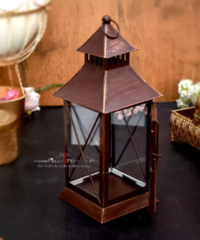 Decorative Modern Lantern, Indoor Lantern, Outdoor Lantern, House Decoration Lantern, Brown Antique Lantern, Gold Lantern, Glass Window Lantern, Festival Gift Lantern, Occasion Gift Lantern, Sturdy Metal Lantern, GI Metal Lantern, Elegant Lantern, Vintage Lantern, Traditional Lantern, Hanging Lantern, Table Lantern, Unique Gift Lantern, Wedding Decor Lantern, Diwali Gift Lantern, Christmas Gift Lantern, Moroccan Style Lantern, Rustic Lantern, Luxury Metal Lantern, Artistic Lantern, Handcrafted Lantern, Premium Lantern, Shadow Effect Lantern, Embossed Metal Lantern, Antique Finish Lantern, Royal Look Lantern, Home Decor Lantern, Holiday Lantern, Designer Lantern, Aesthetic Lantern, Festive Lantern, Warm Glow Lantern, Retro Lantern, Carved Metal Lantern, Glass Panel Lantern, Metal Frame Lantern, Heritage Lantern, Timeless Lantern, Event Decor Lantern, Party Decoration Lantern, Candle Light Lantern, Elegant Glow Lantern, Classic Lantern, Contemporary Lantern, Decorative Hanging Lantern, Vintage Gold Lantern, Rustic Brown Lantern, Industrial Style Lantern, Ornate Lantern, Handicraft Lantern, Lantern for Balcony, Patio Lantern, Courtyard Lantern, Entryway Lantern, Handmade GI Lantern, Traditional Metal Lantern, Unique Housewarming Gift, Premium Gifting Lantern.