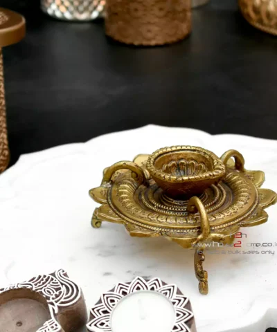 Brass lotus diya, Sanskriti lotus diya, antique brass diya, pooja diya, traditional brass lamp, Indian festival diya, wedding gift diya, diya for home temple, Diwali brass diya, housewarming return gift, Lakshmi pooja diya, handmade diya, lotus shaped diya, decorative brass lamp, diya for mandir, vastu diya, Navratri diya, brass oil lamp, diya for gifting, artisanal diya, Indian decor diya, South Indian brass diya, pure brass diya, pooja essentials, puja diya, brass deepam, spiritual home decor, diya for rituals, handcrafted diya, divine brass diya, temple diya, brass decor piece, diya for aarti, diya with stand, lotus flower diya, vintage diya design, diya set for pooja, Indian brass handicraft, gifting diya, traditional deepak, religious diya, brass deepak, brass diya for Diwali, brass diya India, diya for puja room, diya for Lakshmi pooja, lotus deepak, diya for festive use, diya decoration, diya for temple decor, diya for return gift, diya for pooja room, Indian diya, artisan diya India, diya for Deepavali, kannada deepa, deepam telugu, kannada brass deepa, telugu pooja deepam, diya gift set, diya wedding return gift, diya for Navratri return gift, diya combo set, brass diya bulk order, diya wholesale, decorative diya online, diya pooja item, diya for Indian festivals, diya Diwali decoration, Diwali diya gift, pooja lamp brass, Lakshmi deepam, Krishna pooja diya, diya for prayers, diya Indian traditions, South Indian diya lamp, diya for spiritual use, diya for daily pooja, diya small brass, diya lotus shape, diya for gifting occasions, diya mandir item, Diwali pooja diya, diya for good luck, diya symbol of light, diya positive energy, diya for rituals India, diya handmade India, brass diya 5 inch, brass diya heavy, diya thick base, diya for worship, diya heritage look, diya traditional Indian, Indian spiritual diya, diya in bulk, diya wholesale brass, diya combo gifting, diya handmade India, diya design unique, diya Indian craftsmanship, diya from India, diya from Karnataka, diya from Andhra, diya from Telangana, diya pooja purpose, diya with antique finish, diya glossy look, diya heritage piece, diya pooja collection, diya spiritual feel, diya unique brass, diya lotus motif, diya lotus pattern, diya Indian gift, diya pooja diya, diya South decor, diya wedding pack, diya temple accessory, diya traditional diya, diya Indian theme, diya Indian return gift, diya pure brass finish, diya solid metal, diya auspicious gifting, diya decorative collectible