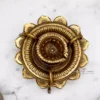 Brass lotus diya, Sanskriti lotus diya, antique brass diya, pooja diya, traditional brass lamp, Indian festival diya, wedding gift diya, diya for home temple, Diwali brass diya, housewarming return gift, Lakshmi pooja diya, handmade diya, lotus shaped diya, decorative brass lamp, diya for mandir, vastu diya, Navratri diya, brass oil lamp, diya for gifting, artisanal diya, Indian decor diya, South Indian brass diya, pure brass diya, pooja essentials, puja diya, brass deepam, spiritual home decor, diya for rituals, handcrafted diya, divine brass diya, temple diya, brass decor piece, diya for aarti, diya with stand, lotus flower diya, vintage diya design, diya set for pooja, Indian brass handicraft, gifting diya, traditional deepak, religious diya, brass deepak, brass diya for Diwali, brass diya India, diya for puja room, diya for Lakshmi pooja, lotus deepak, diya for festive use, diya decoration, diya for temple decor, diya for return gift, diya for pooja room, Indian diya, artisan diya India, diya for Deepavali, kannada deepa, deepam telugu, kannada brass deepa, telugu pooja deepam, diya gift set, diya wedding return gift, diya for Navratri return gift, diya combo set, brass diya bulk order, diya wholesale, decorative diya online, diya pooja item, diya for Indian festivals, diya Diwali decoration, Diwali diya gift, pooja lamp brass, Lakshmi deepam, Krishna pooja diya, diya for prayers, diya Indian traditions, South Indian diya lamp, diya for spiritual use, diya for daily pooja, diya small brass, diya lotus shape, diya for gifting occasions, diya mandir item, Diwali pooja diya, diya for good luck, diya symbol of light, diya positive energy, diya for rituals India, diya handmade India, brass diya 5 inch, brass diya heavy, diya thick base, diya for worship, diya heritage look, diya traditional Indian, Indian spiritual diya, diya in bulk, diya wholesale brass, diya combo gifting, diya handmade India, diya design unique, diya Indian craftsmanship, diya from India, diya from Karnataka, diya from Andhra, diya from Telangana, diya pooja purpose, diya with antique finish, diya glossy look, diya heritage piece, diya pooja collection, diya spiritual feel, diya unique brass, diya lotus motif, diya lotus pattern, diya Indian gift, diya pooja diya, diya South decor, diya wedding pack, diya temple accessory, diya traditional diya, diya Indian theme, diya Indian return gift, diya pure brass finish, diya solid metal, diya auspicious gifting, diya decorative collectible
