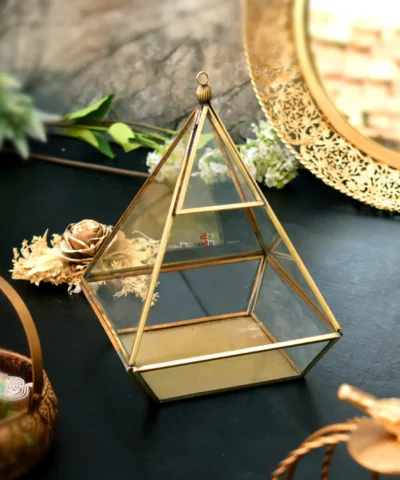 Brass Terrarium, Geometric Brass Terrarium, Conical Brass Terrarium, Hexagonal Brass Terrarium, Quadrilateral Terrarium, Polygonal Terrarium, Glass Terrarium, Brass Glass Terrarium, Decorative Brass Terrarium, Angular Brass Terrarium, Brass Frame Terrarium, Modern Terrarium Design, Designer Brass Terrarium, Luxury Brass Terrarium, Metal Terrarium, Indoor Brass Terrarium, Tabletop Terrarium, Hanging Brass Terrarium, Succulent Terrarium, Air Plant Terrarium, Cactus Planter Terrarium, Decorative Plant Holder, Brass Planter, Geometric Plant Holder, Stylish Glass Planter, Brass Candle Holder, Geometric Brass Candle Holder, Brass Tea Light Holder, Decorative Lantern, Glass Lantern, Brass Lantern, Candle Terrarium, Terrarium Candle Holder, Wedding Centerpiece Terrarium, Diwali Decor Terrarium, Event Decor Terrarium, Hotel Decor Terrarium, Home Decor Terrarium, Boho Terrarium, Rustic Brass Terrarium, Artistic Glass Terrarium, Premium Terrarium Gift, Housewarming Gift Terrarium, Festive Gifting Terrarium, Metal and Glass Terrarium, Minimalist Terrarium, Vintage Terrarium Design, Glass and Metal Planter, Geometric Candle Lantern, Indoor Garden Terrarium, Tabletop Candle Lantern, Centerpiece Glass Lantern, Decorative Polygon Terrarium, Conical Glass Terrarium, Hexagon Candle Lantern, Indoor Decor Planter, Botanical Display Terrarium, Gold Finish Terrarium, Handmade Brass Terrarium, Elegant Glass Terrarium, Giftable Terrarium Holder, Versatile Brass Decor, Luxury Wedding Gift, Trousseau Decor Piece, Floral Display Terrarium, Designer Candle Lantern, Diwali Gift Terrarium, German Silver Look Terrarium, Chic Home Accent Piece, Modern Boho Planter, Designer Table Accent, Glass Display for Succulents, Decor Accent Terrarium, Artistic Home Decor, Terrarium for Office Desk, Small Indoor Greenhouse, Ambient Lighting Decor