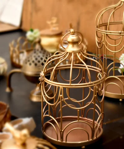 Cage Hamper, Decorative Cage Hamper, Cage Gift Basket, Cage-Shaped Basket, Cage Storage Basket, Cage Shaped Hamper with Handle, Metal Cage Hamper, Designer Cage Hamper, Multipurpose Cage Basket, Fancy Cage Hamper, Cage Lantern, Decorative Lantern, Vintage Cage Lantern, Metal Lantern, Indoor Lantern, Outdoor Lantern, Candle Lantern, Tea Light Lantern, Cage Tea Light Holder, Hanging Tea Light Holder, Tabletop Lantern, Lantern for Living Room, Lantern for Balcony, Moroccan Style Lantern, Golden Cage Lantern, Diwali Lantern, Diwali Decor Item, Festive Lantern, Festival Candle Holder, Holi Decorative Basket, Eid Decoration Lantern, Christmas Candle Holder, Christmas Table Decoration, New Year Party Decor, Seasonal Hamper Decor, Indoor Decorative Basket, Outdoor Decorative Basket, Centerpiece Basket, Dining Table Decor, Living Room Decor Accent, Home Decor Basket, Decorative Metal Basket, Entryway Table Decor, Boho Home Decor, Modern Table Centerpiece, Rustic Table Decor, Vintage Home Accent, Aesthetic Storage Basket, Housewarming Gift Basket, Gift Hamper Basket, Return Gift Basket, Wedding Gift Basket, Housewarming Hamper, Birthday Hamper Basket, Kitty Party Gift, Engagement Gift Hamper, Trousseau Packing Basket, Diwali Gift Hamper, Holi Hamper Basket, Rakhi Gift Hamper, Corporate Gift Basket, Holiday Gift Hamper, Anniversary Hamper, Metal Wire Basket, Golden Cage Basket, Rose Gold Lantern, Black Cage Candle Holder, Copper Cage Decor, Antique Finish Hamper, Matte Finish Cage Basket, Handcrafted Metal Basket, Handmade Cage Hamper, Moradabad Handicraft Basket.